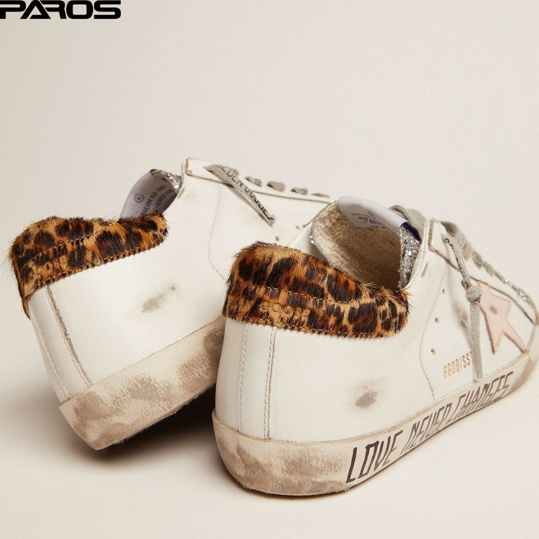 Golden Goose Superstar in silver glitter tongue and handwritten lettering on the foxing